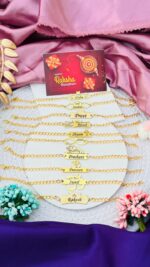 Custom gold name chain Rakhi bracelet with engraved name and adjustable stainless steel chain.