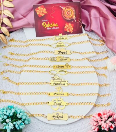 Custom gold name chain Rakhi bracelet with engraved name and adjustable stainless steel chain.