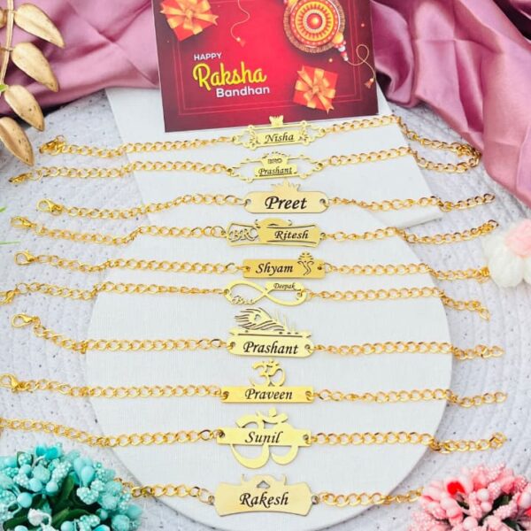 Custom gold name chain Rakhi bracelet with engraved name and adjustable stainless steel chain.