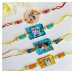 Handmade resin photo Rakhi featuring a personalized image with elegant gold flakes and a premium red Rakhi thread.
