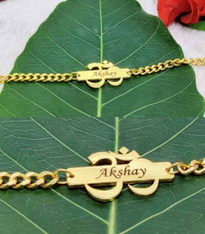 Personalized Metal Om Chain Rakhi with custom engraved name, gold-finish stainless steel Om symbol, and adjustable chain bracelet for Raksha Bandhan.