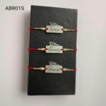 Custom engraved feather design Rakhi in premium gold and silver finish for Raksha Bandhan celebrations.